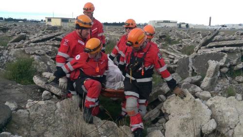 Running through a rubble rescue exercise.